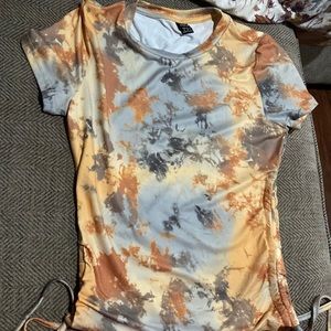 It is From SHEIN, size medium and it is mixed colors with orange, greyish tan